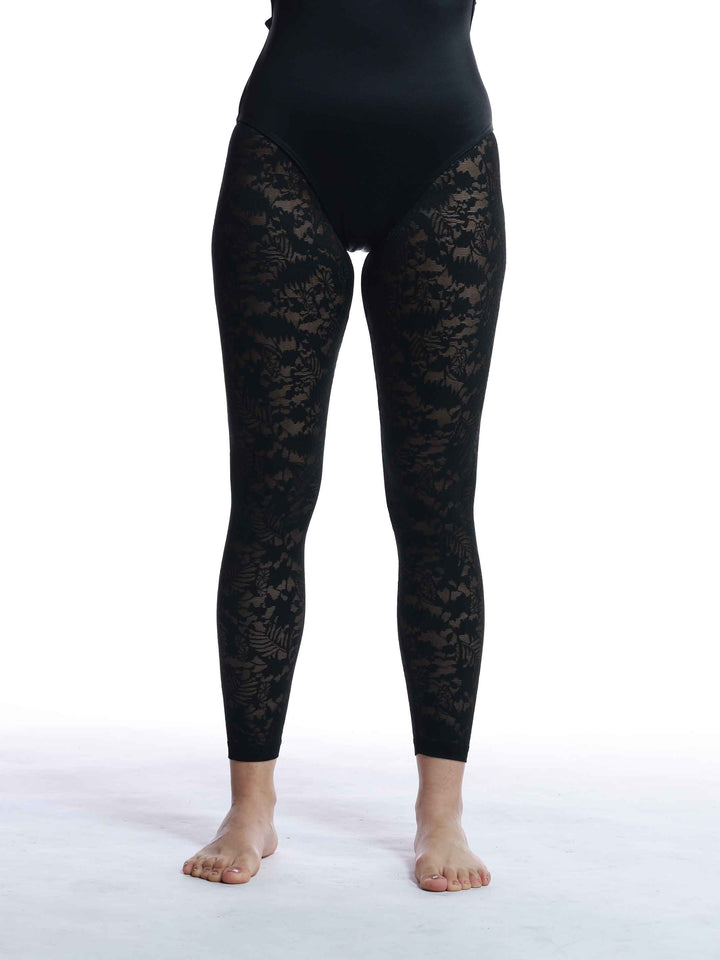 Détail du motif floral in Spitze des Strumpfhosen für Damen - design raffiné