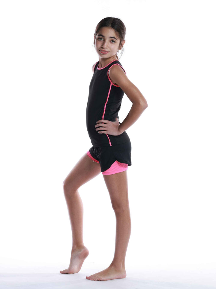 Ensemble de sport perforé noir et rose vif pour filles - vue de profil montrant les détails perforés