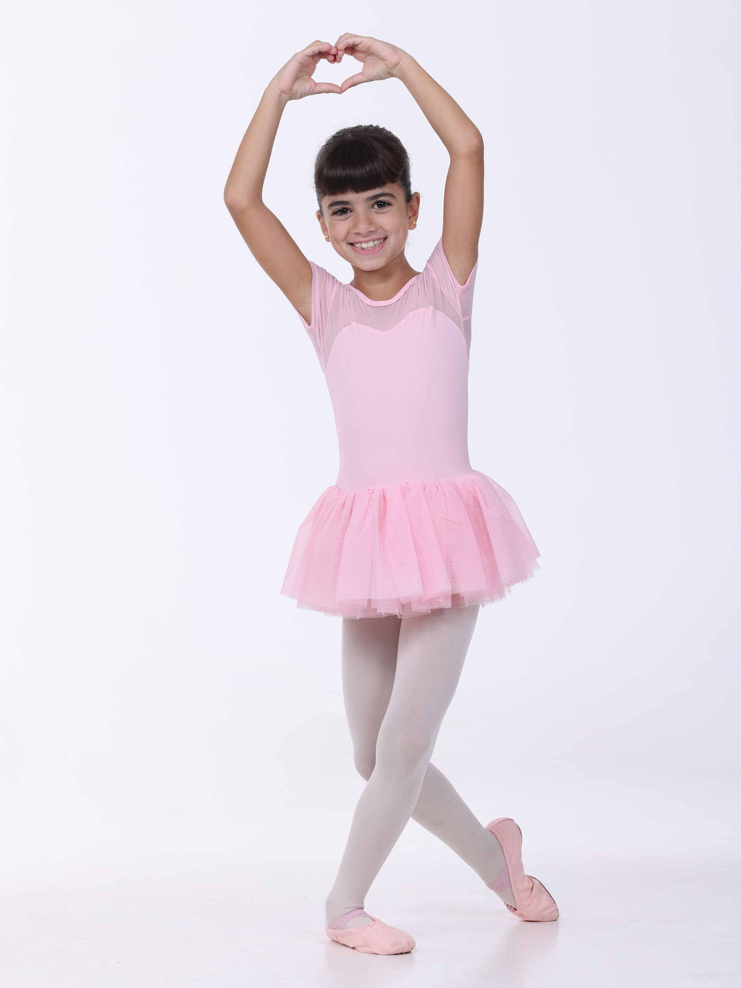 Danseuse in pose classique con abito rosa clair – gonna tutu e buste effet cœur.