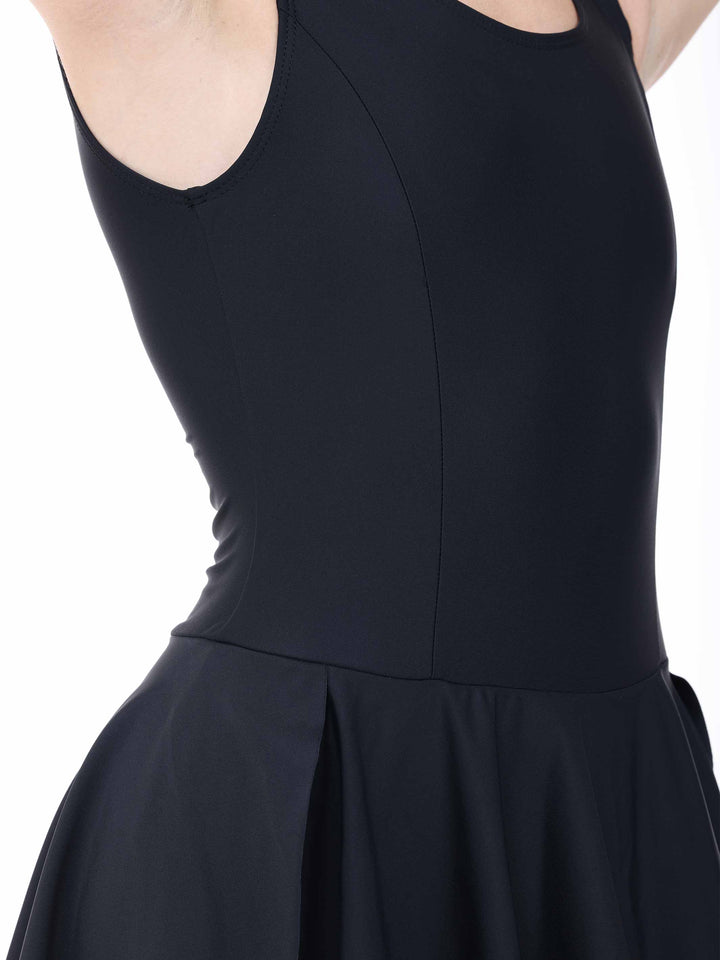 Vue rapprochée of the tissu and of coutures d’a dress of danse blacke – matière stretch and elegant.