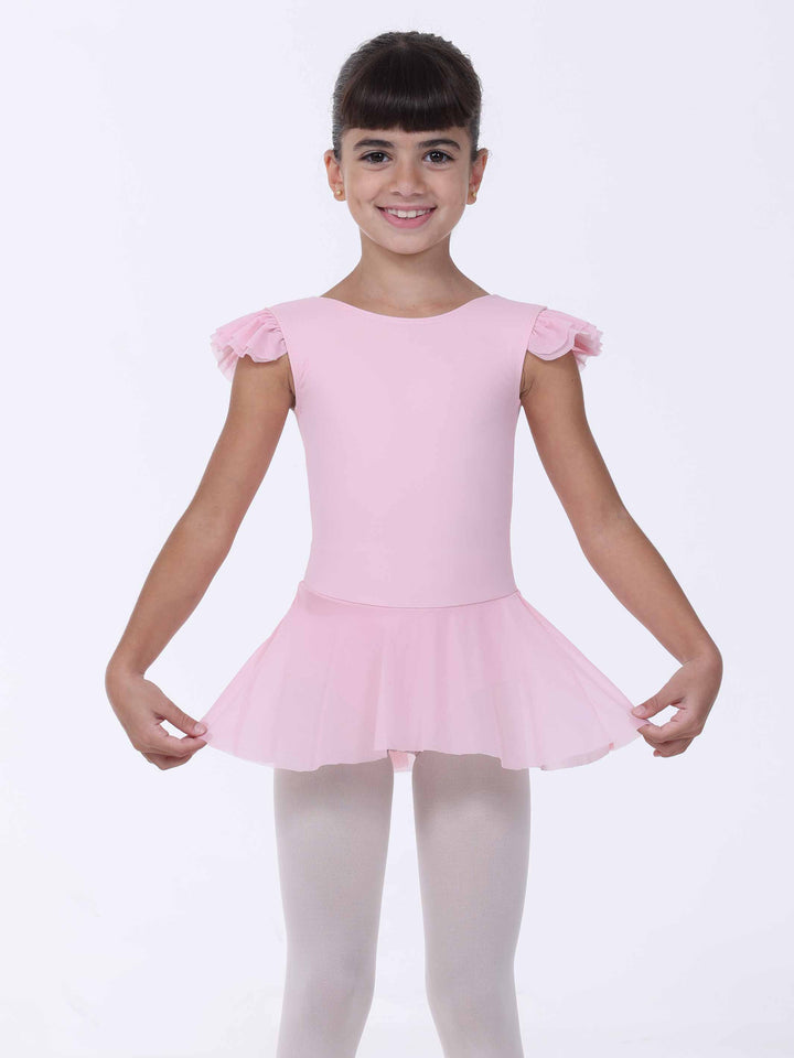 Danseuse in abito di danse rosa clair – gonna légère e épaules ornées di volants.
