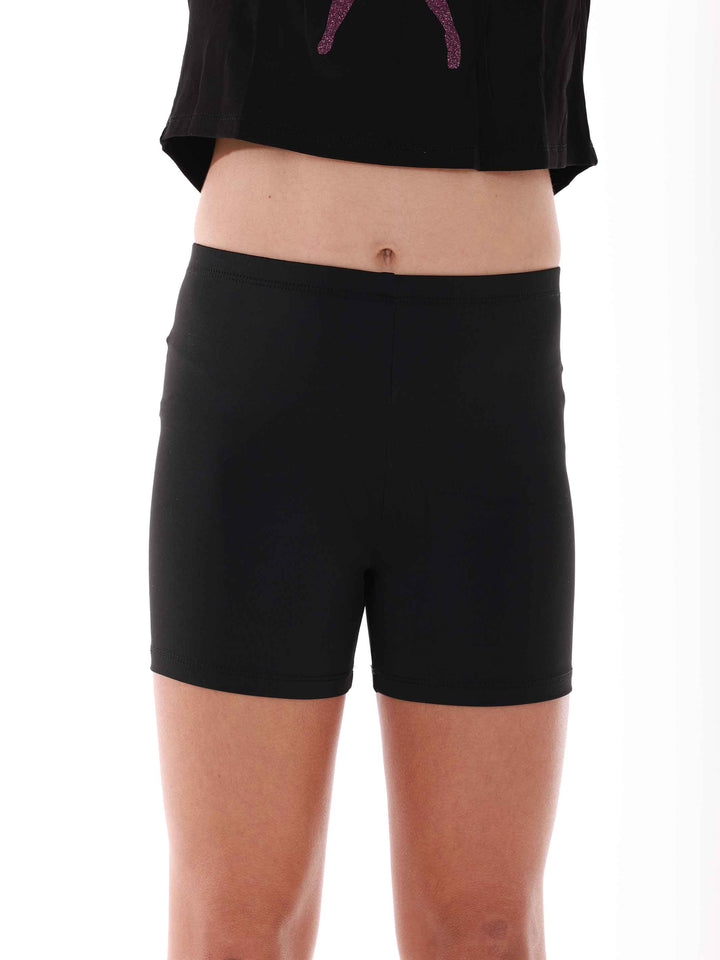 Short basique de danse et gymnastique for girls, black, avec forme culotte pour un ajustement comfortable. Size élastique de 2 cm pour un maintien parfait et coupe courte pour une freedom of movement optimale. Parfait pour les class de danse, la gymnastique et autres activités sportives