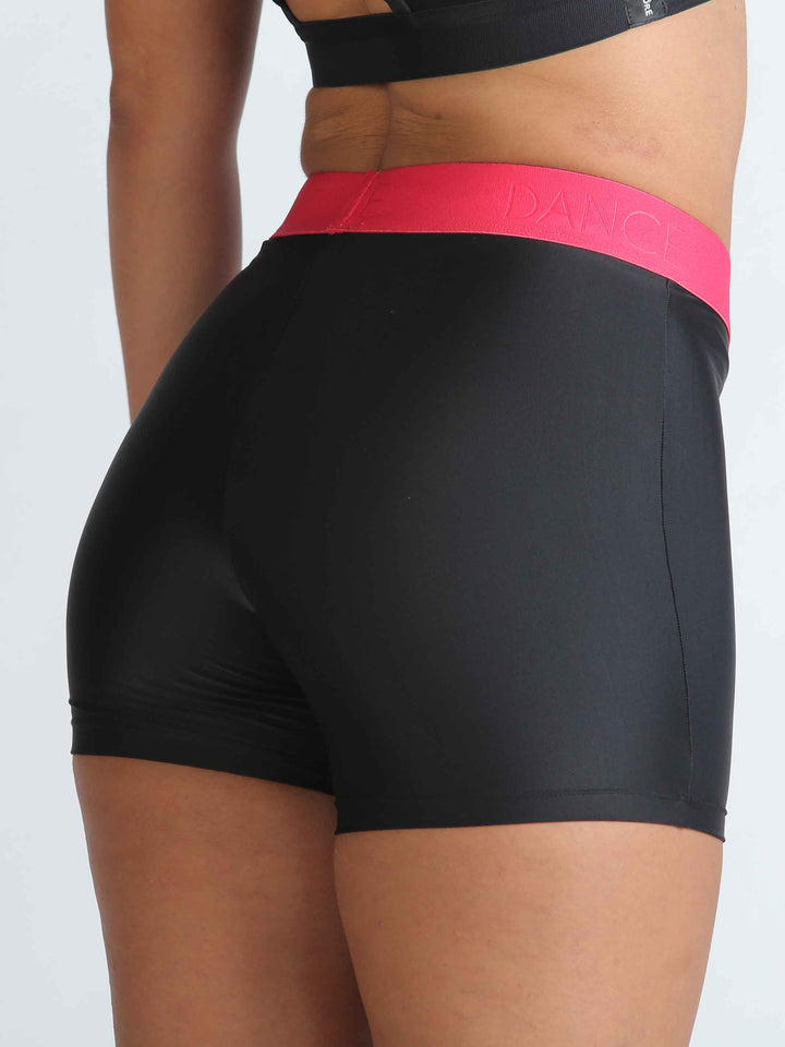 Short di danse rosa vif taille basse - détail di la bande élastique